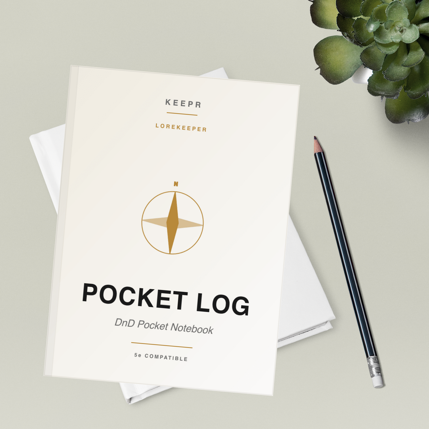 Lorekeeper Pocket Log — styled flatlay
